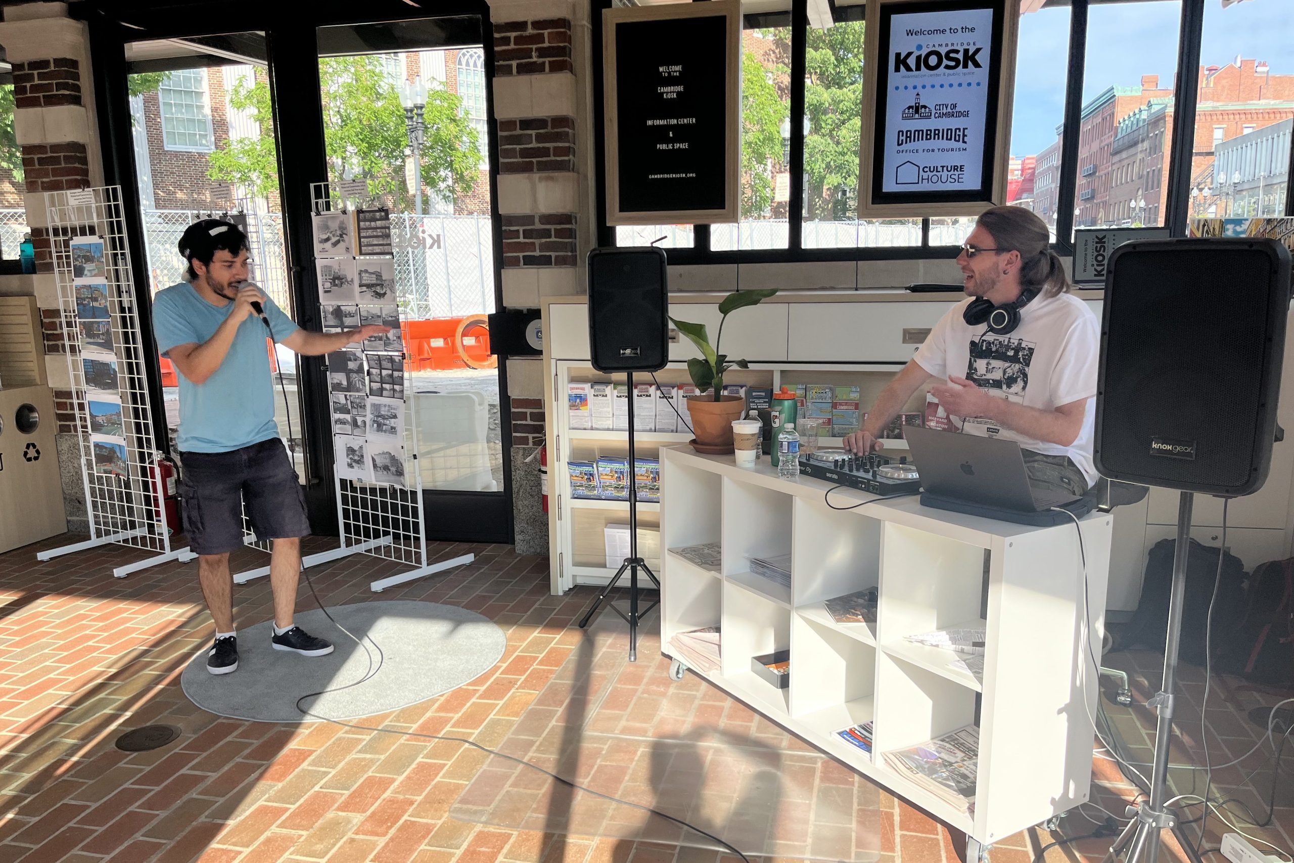 People performing at the Kiosk