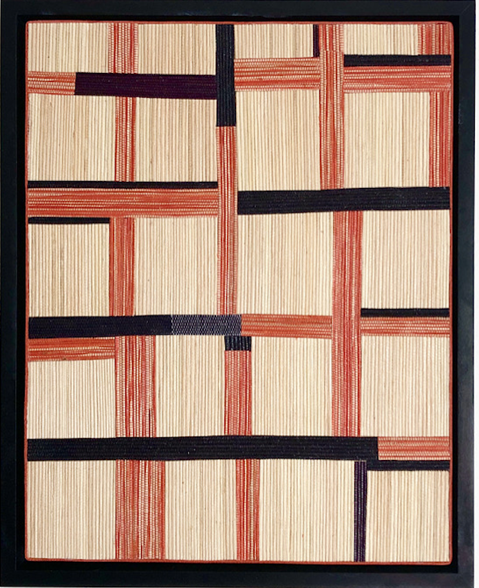 interwoven raffia textiles in beige, orange and black